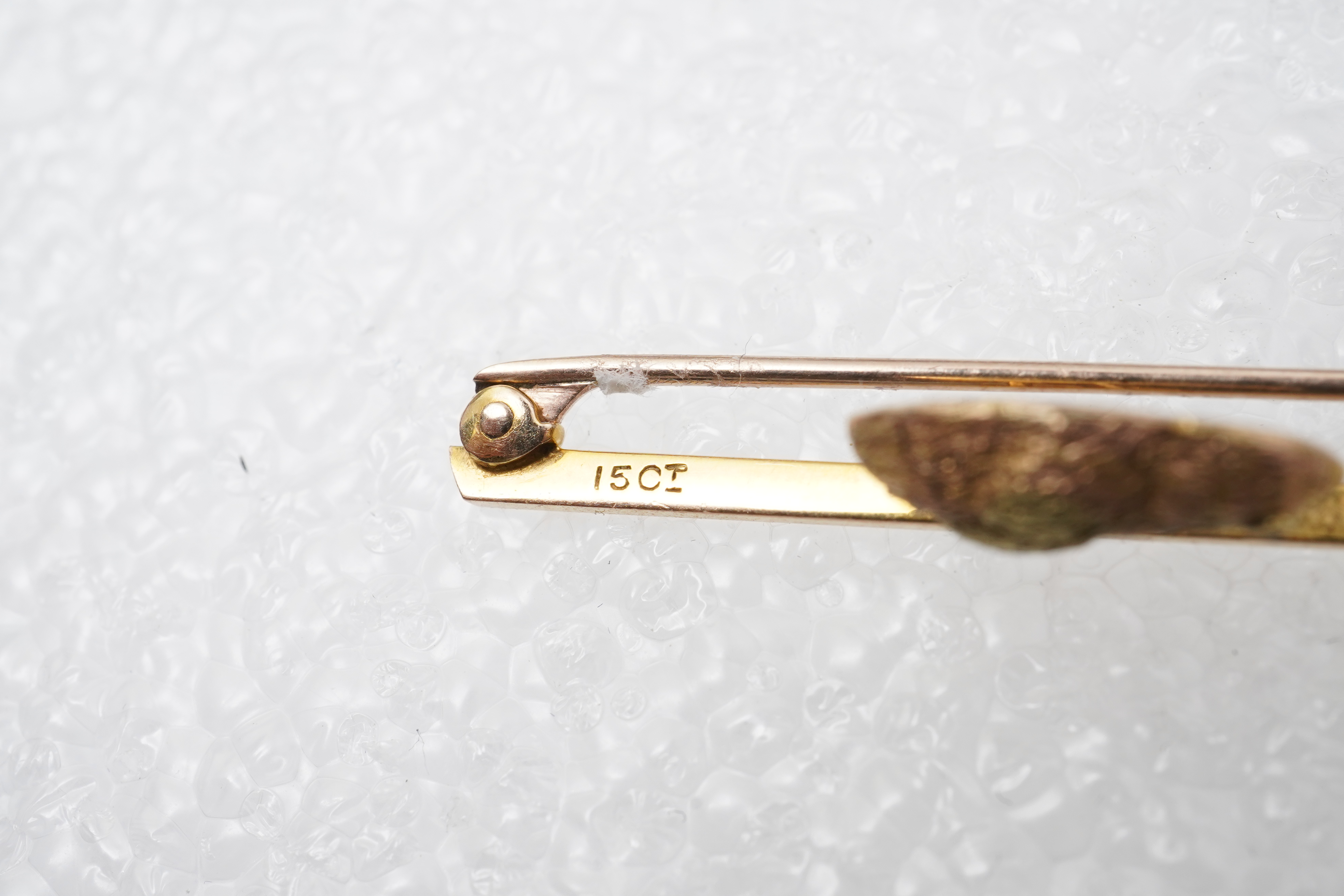 A gold and seed pearl novelty bar brooch, circa 1900